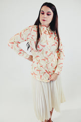 vintage long sleeve button up blouse cream collar with tan and orange pattern pointy collar front