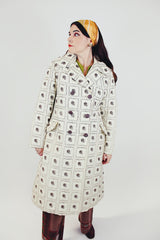 women's vintage white puffy pea coat with brown embroidered pineapple print front