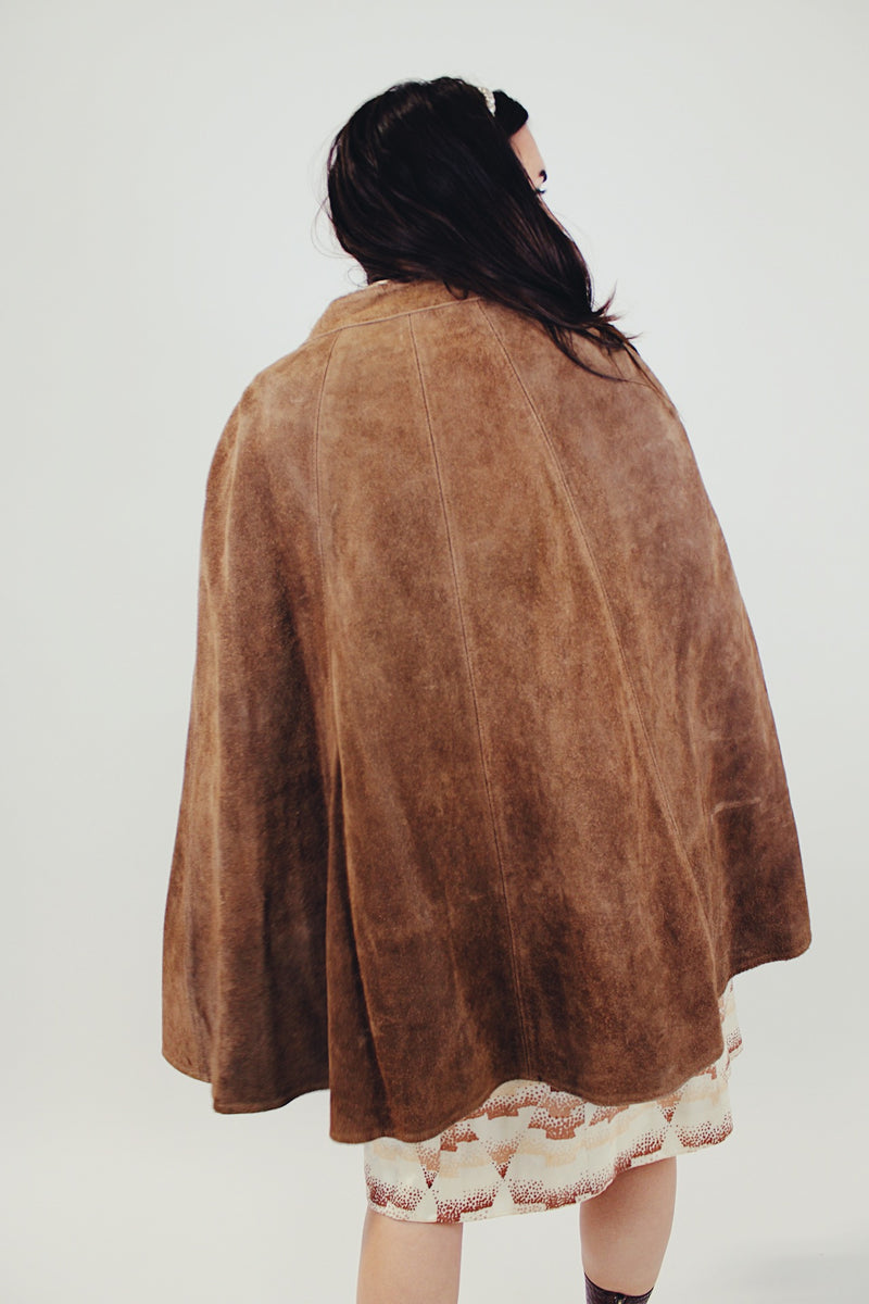 women's vintage two tone brown suede poncho with popper closure and suede flower on the front back