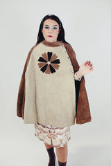 women's vintage two tone brown suede poncho with popper closure and suede flower on the front 