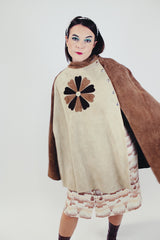 women's vintage two tone brown suede poncho with popper closure and suede flower on the front side