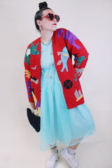Women's vintage 1980's Mr. Girasol, Made in Mexico label long sleeve open front lightweight jacket in red with all over multicolored animals. 