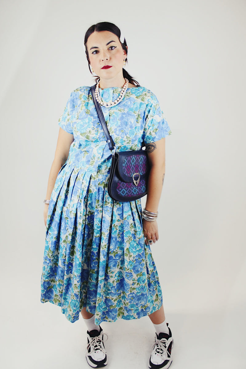 short sleeve blue floral print midi length dress with a line structure women's vintage 1960's