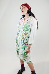 long sleeve mid length shirt dress in white with all over bird print polyester women's vintage 1960's