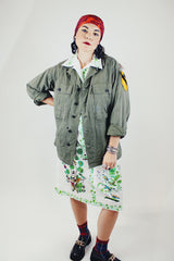 long sleeve green army jacket buttons up with two chest pockets vintage