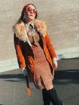 Women's vintage 1970's Leatherscapade, Made in Argentina label long sleeve brown orange genuine leather suede coat with faux fur trim and shearling liner with matching tie belt.