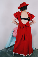 Women's vintage 1970's short sleeve flutter sleeve red velvet ankle length dress with white applique trim. 