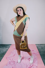 knitted sleeveless sweater and matching pencil skirt set in brown with green and yellow geometric pattern on top vintage women's 1980's