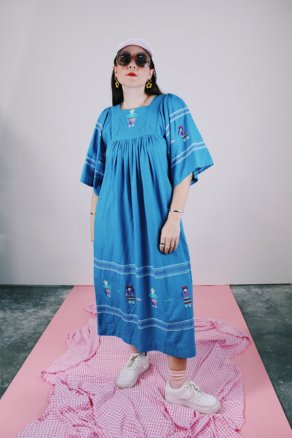 blue cotton ankle length dress short sleeves with embroidery throughout