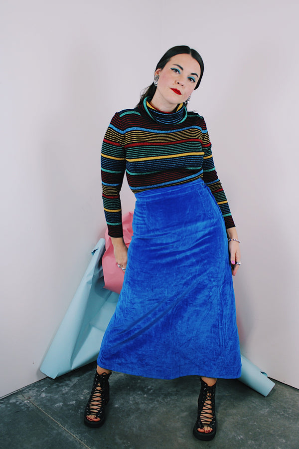 Women's vintage 1970's vibrant cobalt blue velvet midi skirt with a two button and zipper side closure