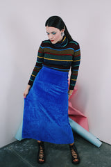Women's vintage 1970's vibrant cobalt blue velvet midi skirt with a two button and zipper side closure