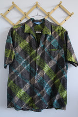 Women's or men's vintage 1970's Sportsman by Cal-Made California short sleeve printed button up shirt with collar. 