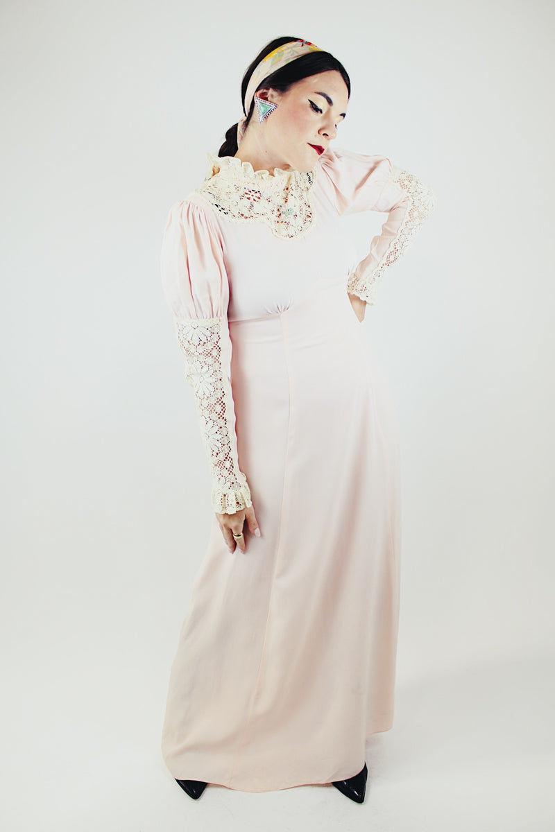 long sleeve light pink maxi dress with crochet lace details and tie belt vintage 1940's