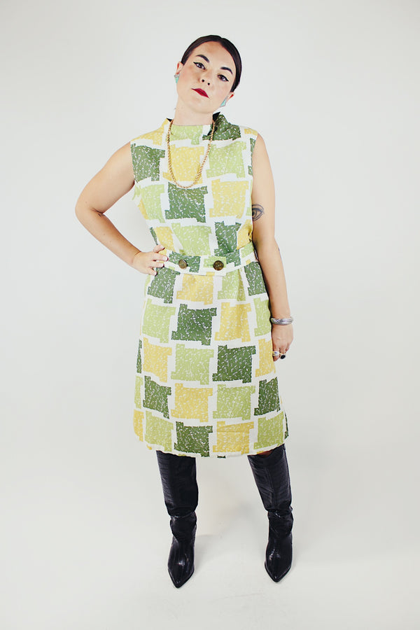 sleeveless green square print midi dress with high neck and matching belt vintage 1960's