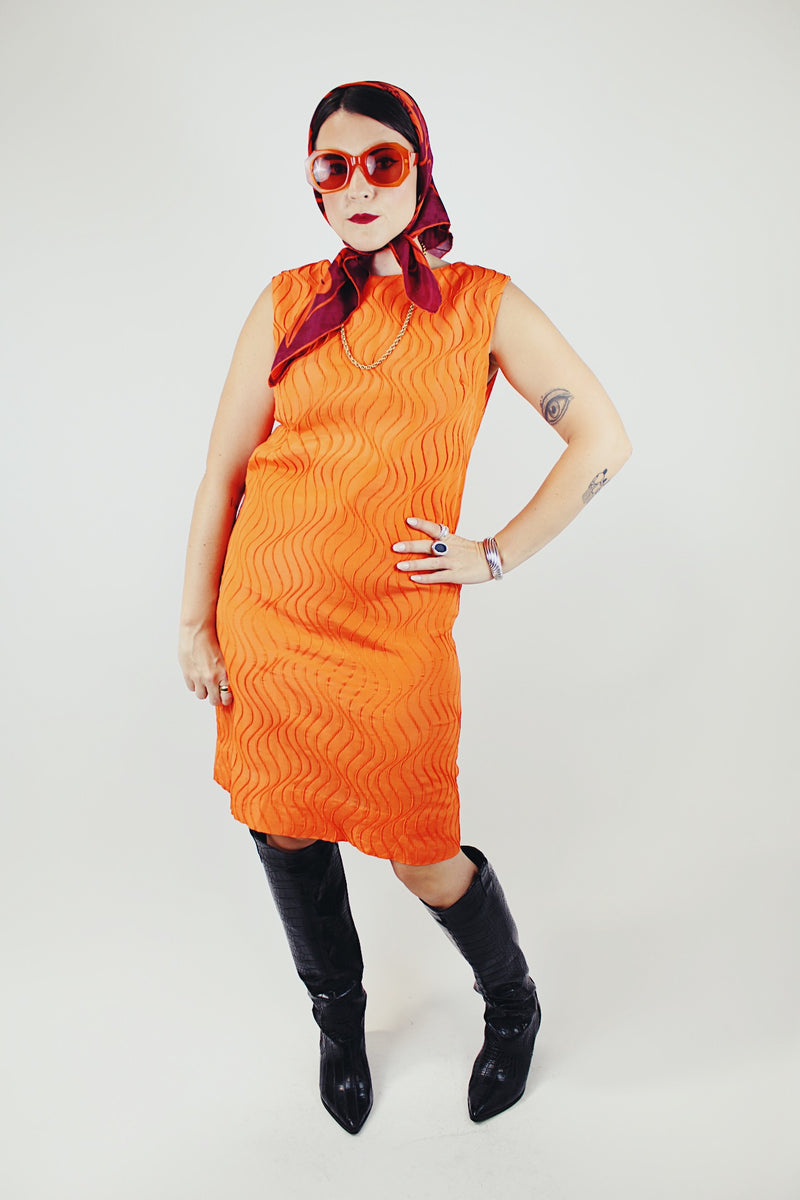 sleeveless knee length textured material orange dress vintage 1960's