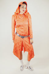 long sleeve orange silk dress with polka dot print and asymmetrical hem vintage 1980's