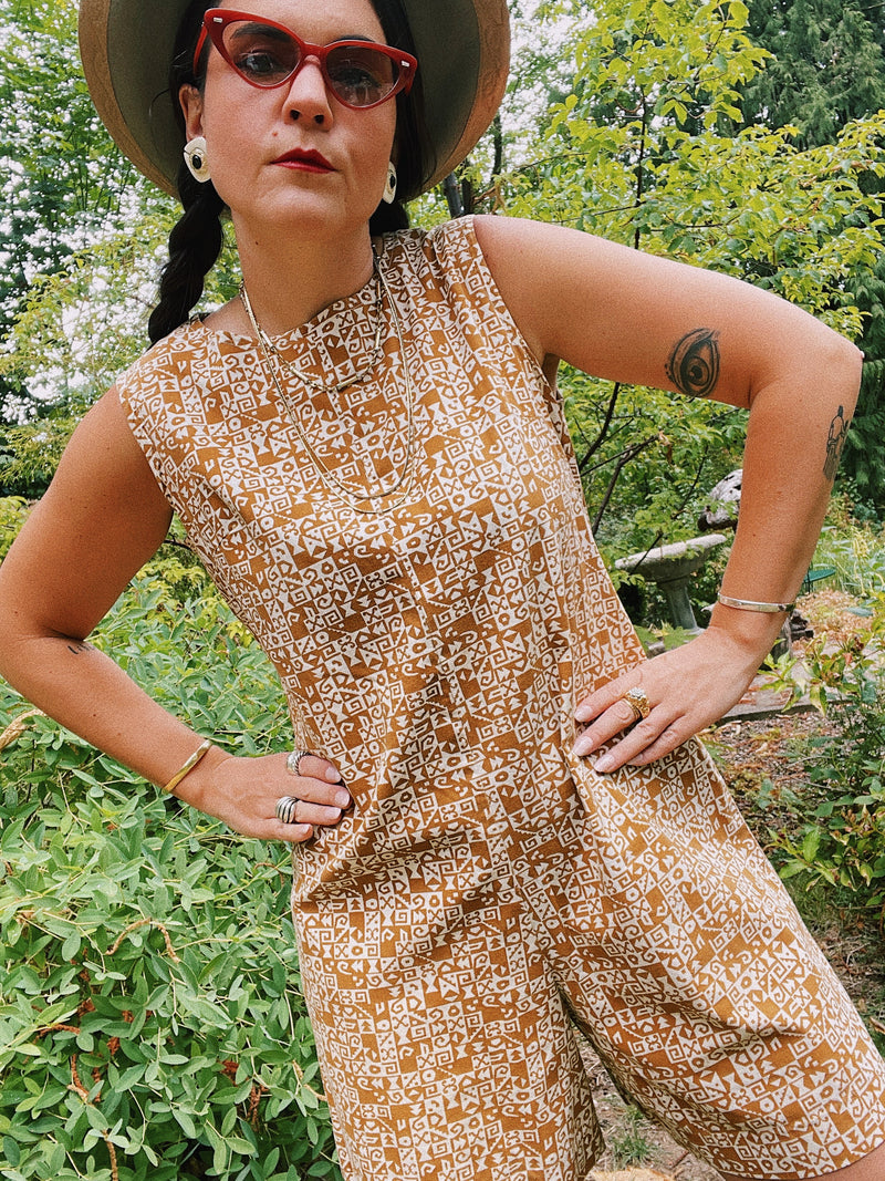 sleeveless brown and cream printed romper with zipper in the back short length women's vintage 1960's
