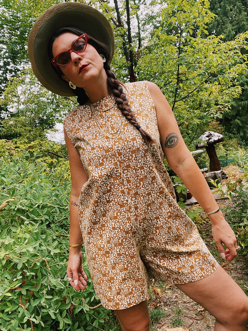 sleeveless brown and cream printed romper with zipper in the back short length women's vintage 1960's