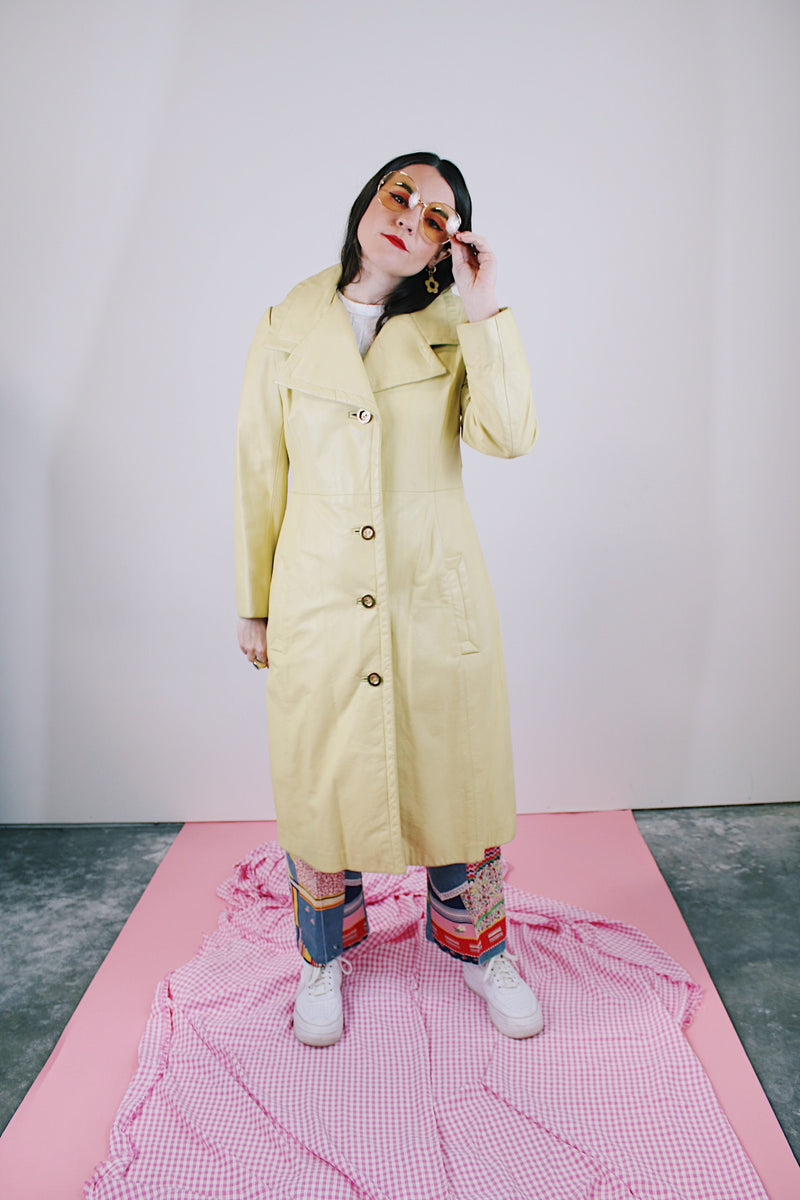 long sleeve long length citrus yellow leather coat buttons up the front vintage women's 1970's