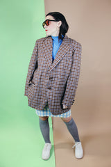 Men's vintage 1970's Varsity Town by Seinsheimer label long sleeve two button closure checkered blazer in brown, tan, and blue wool. 