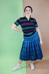Women's vintage 1980's Miss Pendleton, Made in USA label midi length pleated wool plaid print skirt in blue, green, and pink colors.