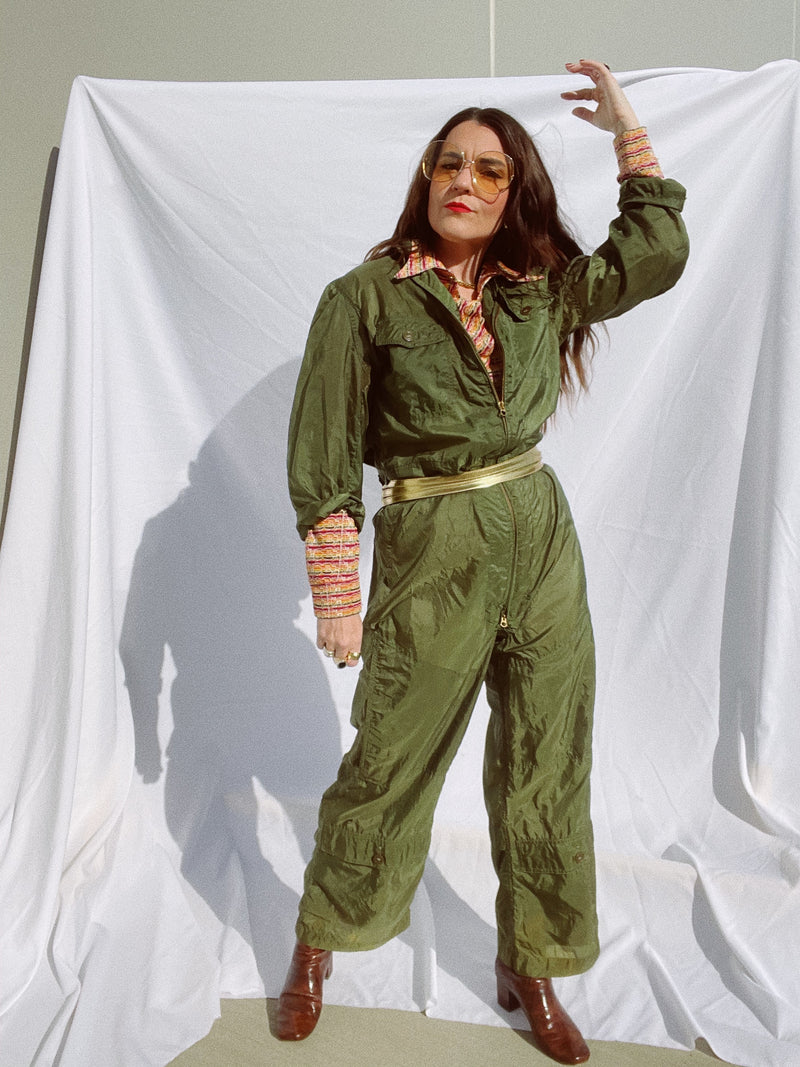 long sleeve army green jumpsuit zips up the front vintage