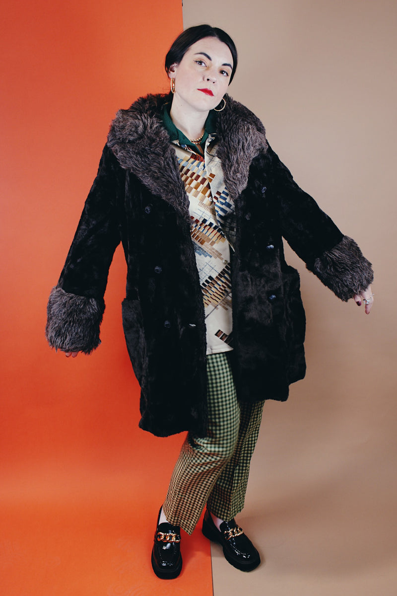 Women's vintage 1970's Styled by Davis of Boston, A Division of Jonathan Logan label long sleeve faux fur coat in two different tones of brown and texture.
