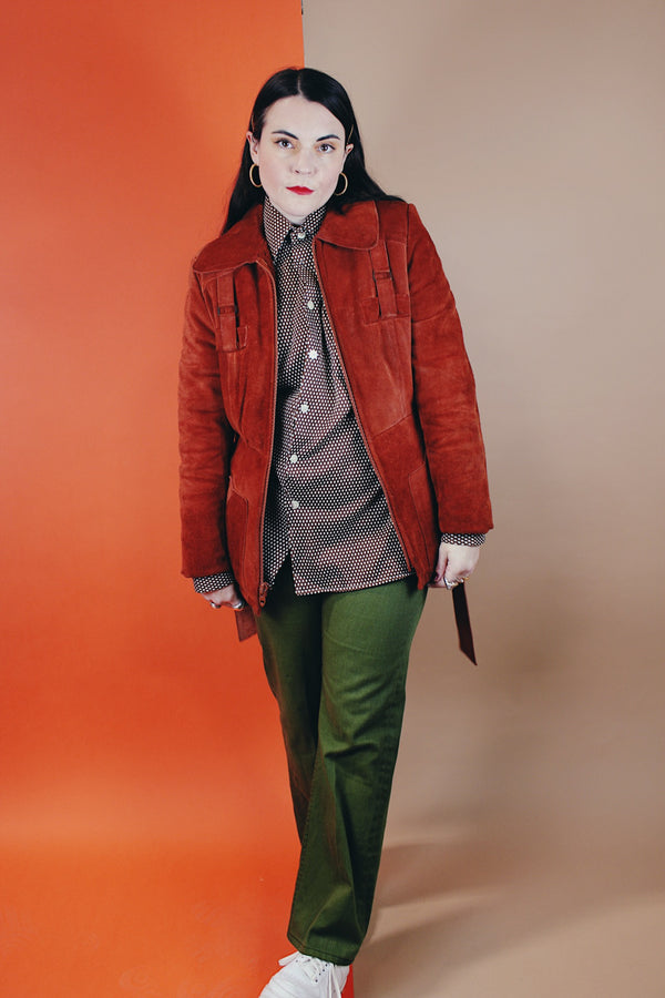 Women's vintage 1970's Genuine Leather, Made in Uruguay label burn orange suede leather zip up jacket with collar and matching tie belt and a faux fur liner