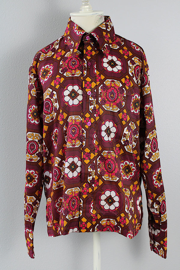 Women's or men's vintage 1970's Marlboro label long sleeve button up shirt with point collar in a lightweight polyester material and magenta, brown, orange, and white all over print.