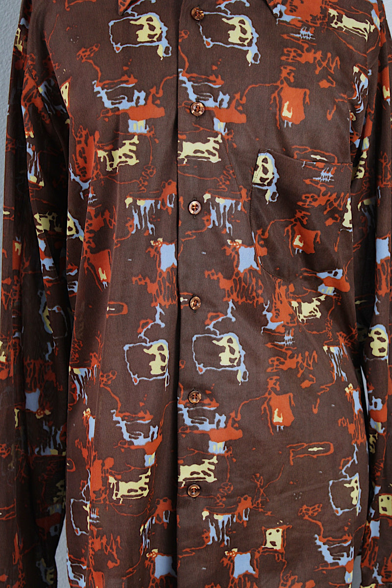Men's or women's vintage 1970's Knit Collection, Bonds label long sleeve brown polyester material button up shirt with pointy collar with all over abstract print. 