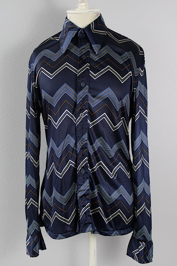 Women's or men's vintage 1970's Roland label long sleeve button up shirt with a pointy collar in navy slinky polyester with a zig zag print.