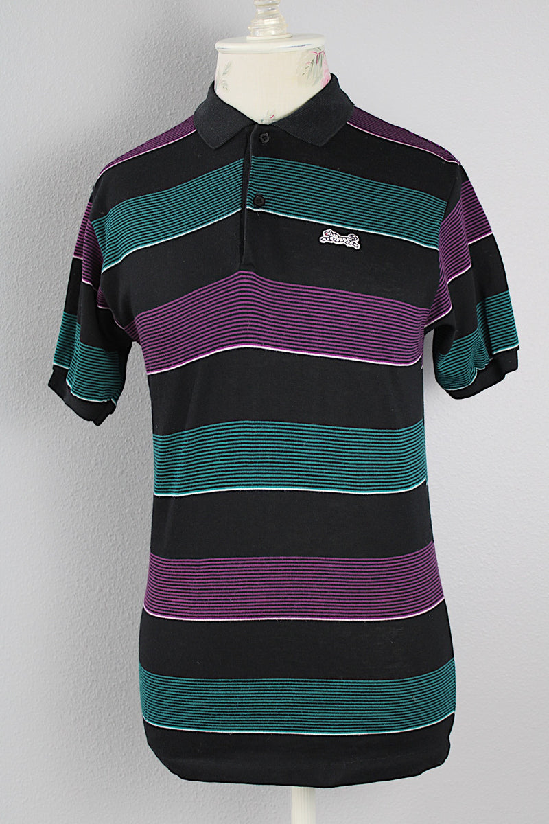 Women's vintage 1980's Le Tigre, Made in USA label short sleeve striped polo t-shirt with a black ribbed collar and two button half closure. 