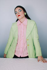 Women's vintage 1960's Saks Alley long sleeve two button closure double lapel blazer in light green and linen material.