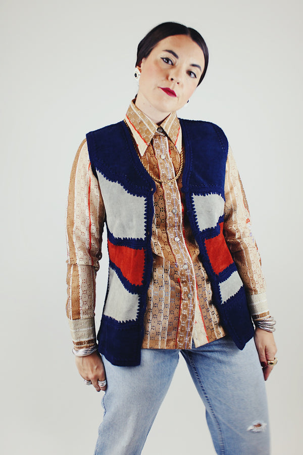 navy knit button up vest with grey and brown suede panels in the front vintage 1970's
