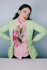 Women's vintage 1960's Saks Alley long sleeve two button closure double lapel blazer in light green and linen material.