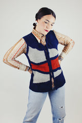 navy knit button up vest with grey and brown suede panels in the front vintage 1970's