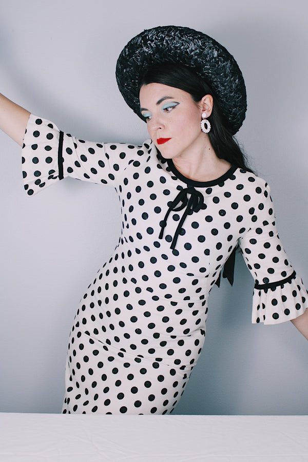 Women's vintage 1960's Gallant California short sleeve white linen dress with black polka dots all over. Has black bow tie on neck. 