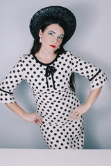 Women's vintage 1960's Gallant California short sleeve white linen dress with black polka dots all over. Has black bow tie on neck. 