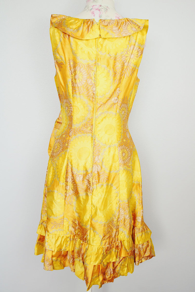 sleeveless knee length floral print yellow dress with ruffle trim vintage 1960s