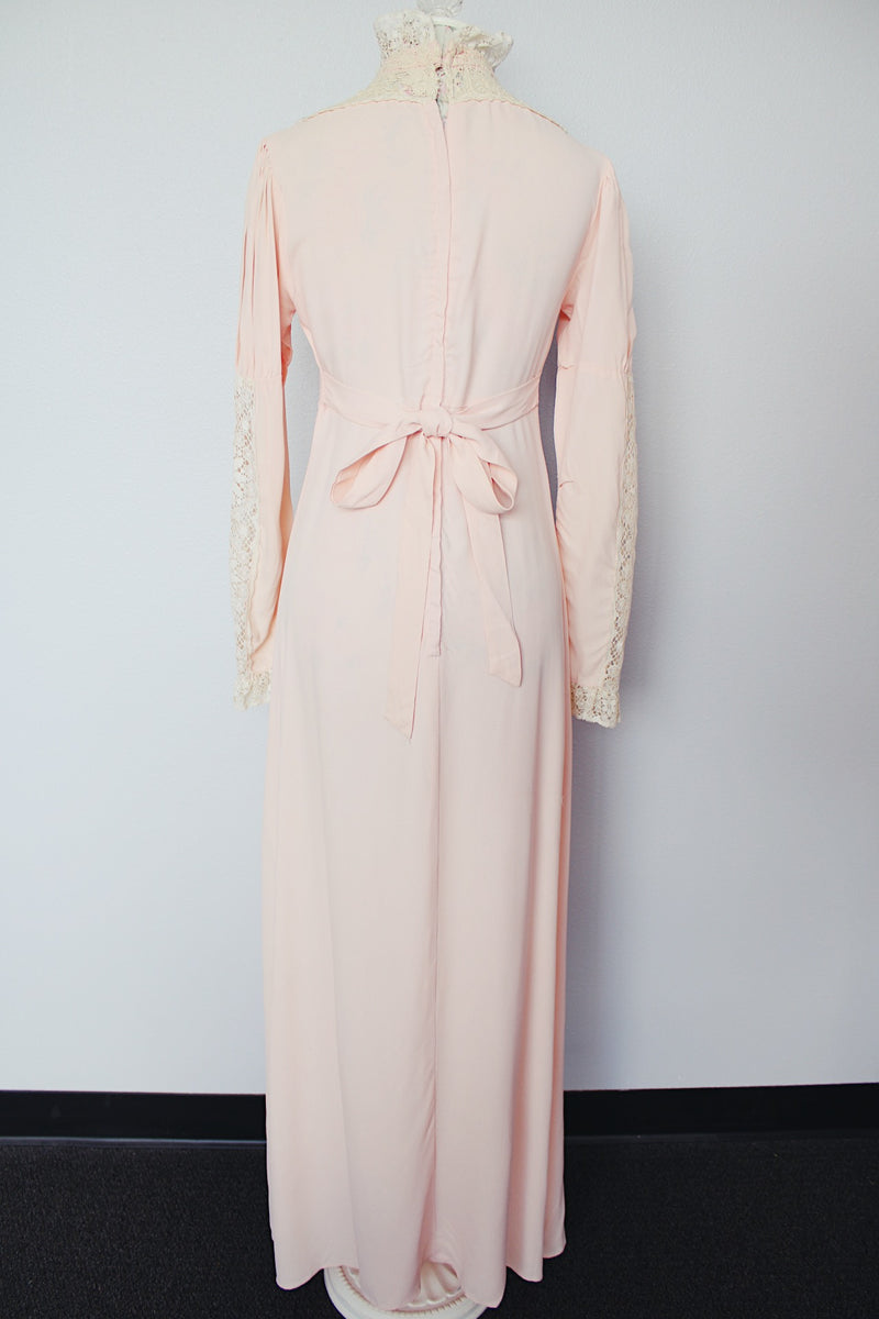 long sleeve light pink maxi dress with crochet lace details and tie belt vintage 1940's