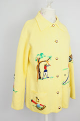 long sleeve yellow button up cardigan with collar and all over embroidery vintage 1960's