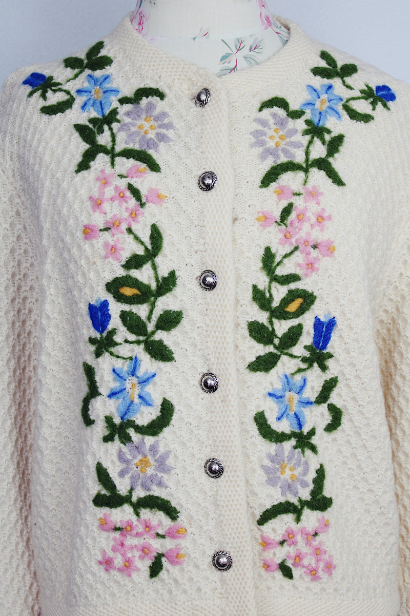 long sleeve cream colored wool cardigan with embroidered flowers and silver buttons vintage 1960's