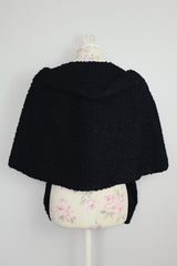 textured boucle black shawl with one closure longer in the front vintage 1940's