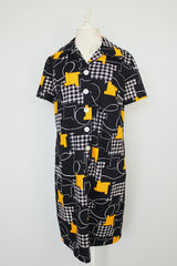 short sleeve knee length black printed polyester shirt dress with collar vintage 1970's