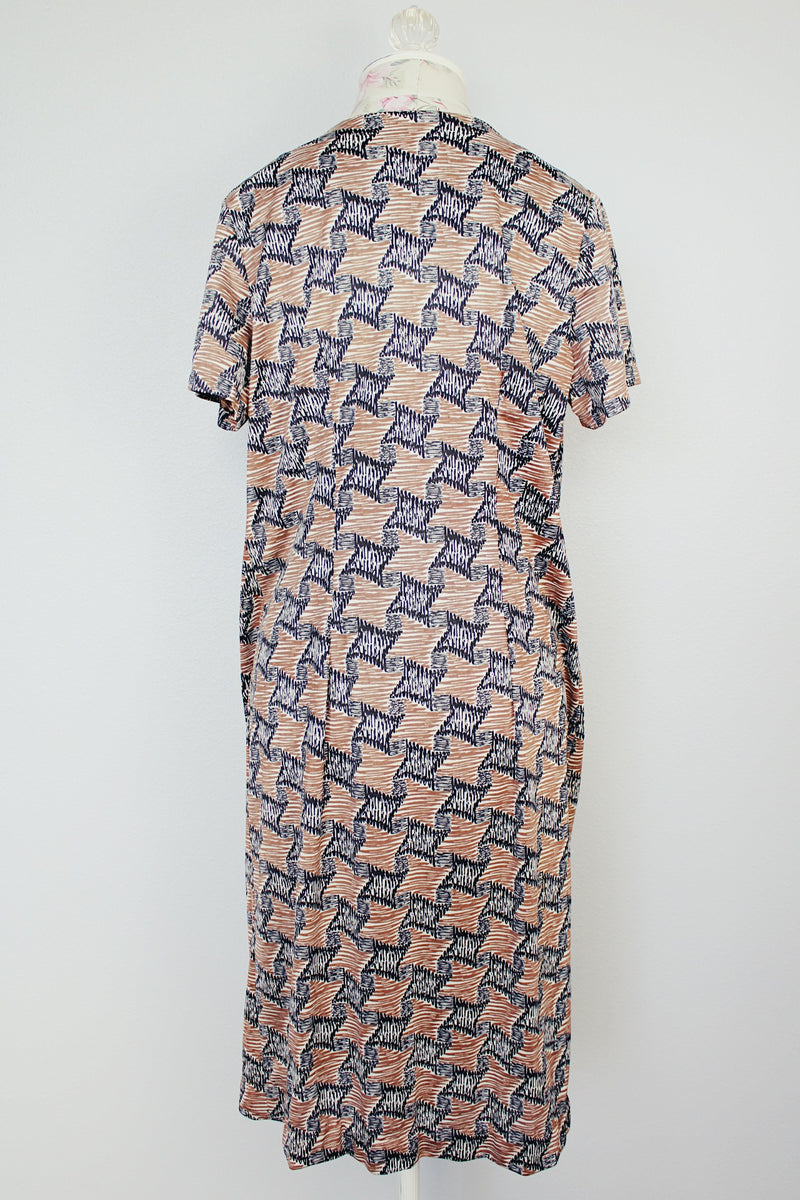 black and brown abstract print short sleeve mid length zip up dress vintage 1960's