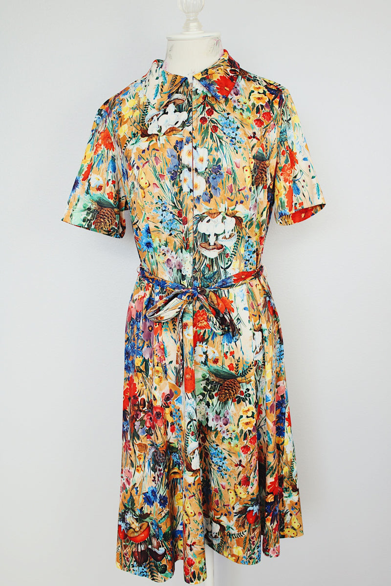 all over floral print short sleeve knee length dress with front half zipper and matching tie belt vintage 1970's