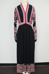 long sleeve v neck maxi dress in black with paisley print vintage 1970's