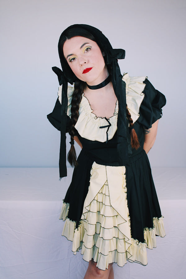 Women's vintage 1970's SaSabobs label two piece top and skirt set square dance costume in black and white.