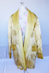 Women's vintage 1960's long sleeve gold yellow satin open front robe jacket with overall embroidered pattern