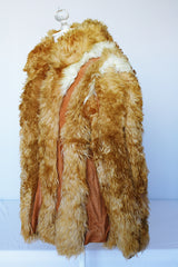 Women's vintage 1970's Designer Originals, Dino Ricco label long sleeve zip up tan brown faux fur jacket with rounded collar and side pockets.